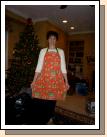 This apron used to belong to my mother and she would wear it Christmas Eve.  My sister Melanie has had it these past 13 years and offered it to me when I was helping her move.  It was fun to wear it. We miss her.