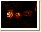 Some of the jack-o-lanterns -- the one on the right is Madeleine's Cheshire Cat.
