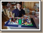 All the kids in the fourth grade had an assignment to make a castle and bring it to school.  Being the Lego nut that he is, Elliot had a fun time designing his.