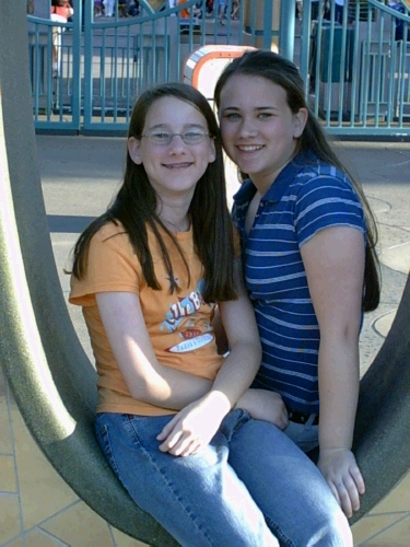 Madeleine and Tess sitting inside the O of California.