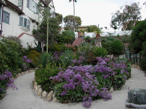 To get to the cove, you walk down the stairs from the street and through this beautiful garden to some more stairs below.