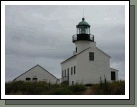 The "old" Point Loma Lighthouse.  Because it was often  obscured by fog, a "new" Point Loma lighthouse was built down on the coast.