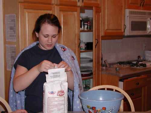 Tess got a note attached to a bag of flour that said she was supposed to look in the flour for the name of the boy who was asking her to the dance.