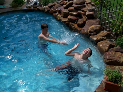 Elliot and Clark having a great time in Barrie and Bonnie's pool!