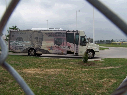 ...and a picture of the shuttle bus we rode to the factory -- cool bus huh?  They say, the buck starts here...we had to explain it to the kids!  Sometimes I feel so old....