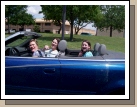 The girls get a ride in Bonnie's new blue convertible.