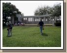 Alan walking up the famous "grassy knoll," which was on one side of the street.