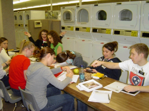 Doing laundry, writing home and making a tape for our family on their P-day.  Just how many washing machines do you think they have at the MTC?