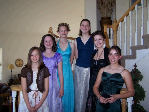 Madeleine (in purple) with her girlfriends.  They all came over to our house to get ready.  Since Waterford is such a small school, the kids can go "stag," so that there will be enough people at the dance.