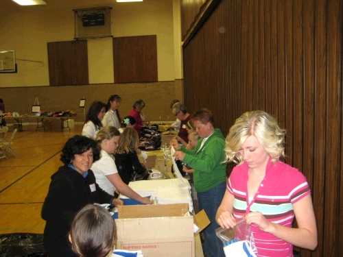 Assembling school and hygiene kits for children in inner-city schools.