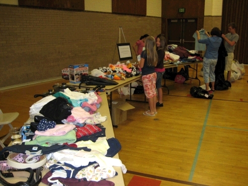 Collecting clothing for children in need.