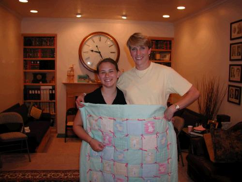 For a personal progress project, Tess learned how to make and tie a baby quilt which she gave to Melinda.