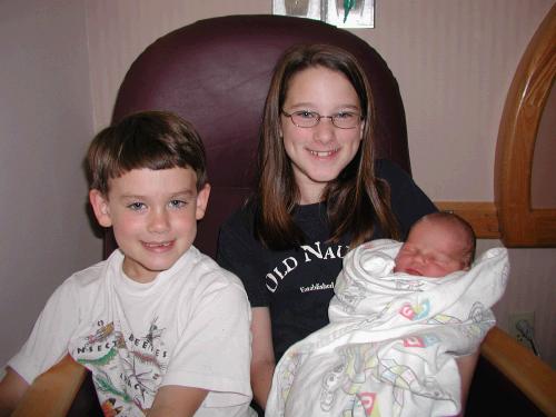 Clark and Madeleine with their new cousin.