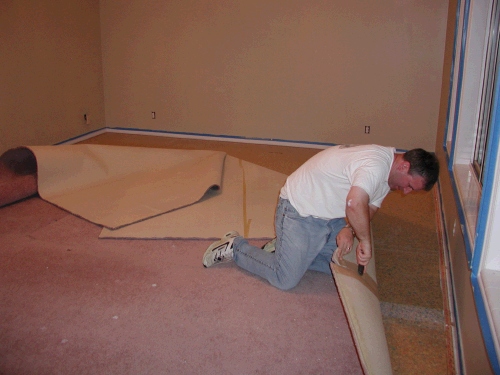 Alan ripping up the carpet -- goodbye, mauve!