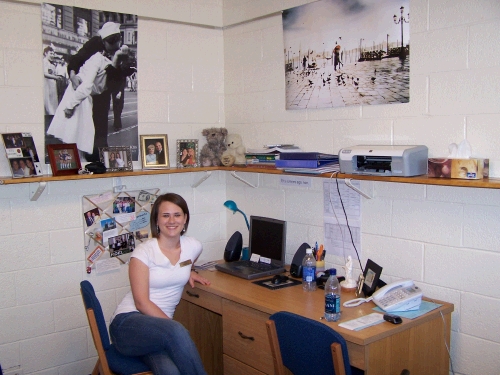 She gets her own room...2 closets, both sides of the desk etc.  Wahoo!  Oh...and a badge....