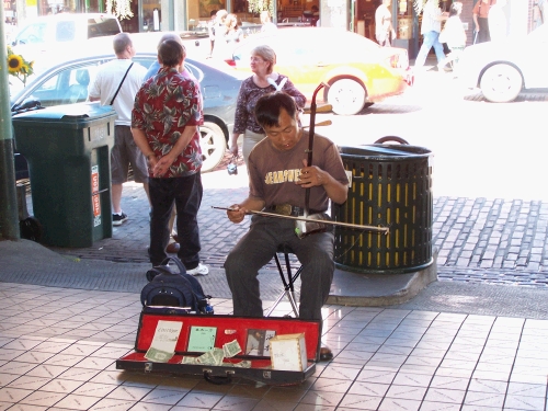 I saw this guy and was reminded of the BYU commercial where a guy just like this in China plays the Cougar fight song!