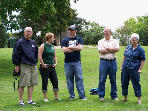 It was important to stand around to watch and critique each other's lack of skill at this new and innovative game.