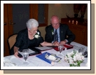 Pat and Wally looking at the memory books -- they loved them.  Diane did a wonderful job.