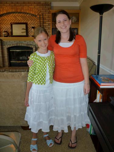 Madeleine and Julia Morgan wearing matchy matchy skirts.