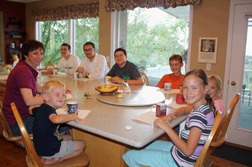 Everyone gathered around the table for the traditional Brown after school snack -- graham crackers and milk!