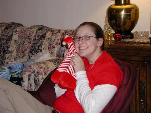 Cute Kaitlin with her favorite white elephant -- or is it a stripy giraffe?