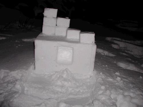 Loren's geometric snow sculpture.  If you are thinking that it looks a tad dark, it is.  They were out so late in the afternoon that it was dark when they finished.