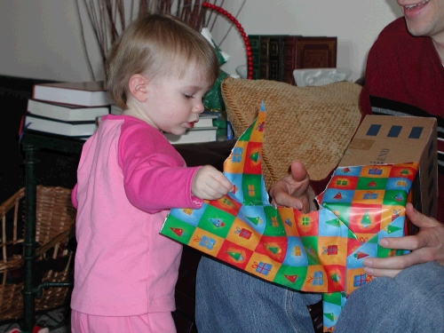 Of course their daughter Karen was in the middle of all the unwrapping.