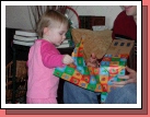 Of course their daughter Karen was in the middle of all the unwrapping.