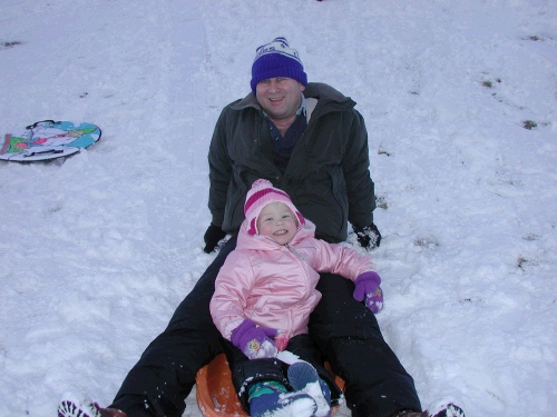 Miranda Hulme with her faithful sledding pal Alan.