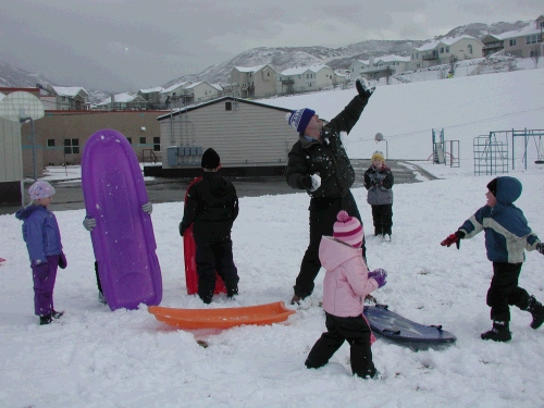 Snowball fight!
Everyone against Alan - sounds fair to me...