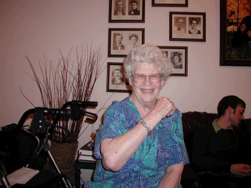 Then we had Shirley open a gift from us.  We gave her a bracelet with a picture of each one of our kids in it.  She loved it -- she is always wishing she had kids or grandkids of her own to brag about -- so we let her borrow ours!