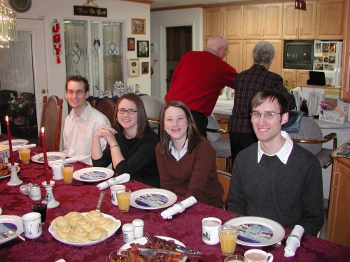 Loren, Tess, Madeleine and Phillip getting ready for Christmas breakfast.