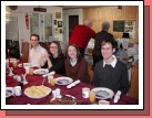 Loren, Tess, Madeleine and Phillip getting ready for Christmas breakfast.