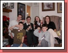 All the kids with their ornament from Grandma and Grandpa -- an ornament with a bit of "green stuff" from their Great Grandma Louise's estate.