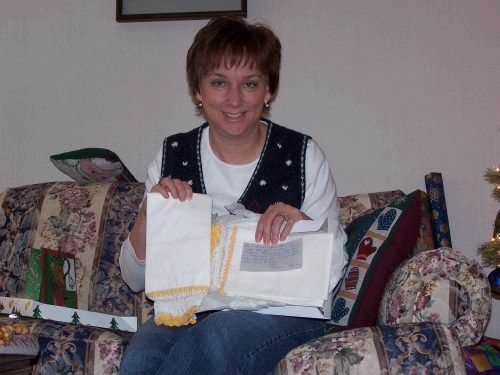 A rare picture of the photographer as I display some pillow cases given to me by Alan's grandmother, Louise Edwards, that were made for her by her husband's mother, Jane Edwards. They are over 50 years old and never used.  Very special.