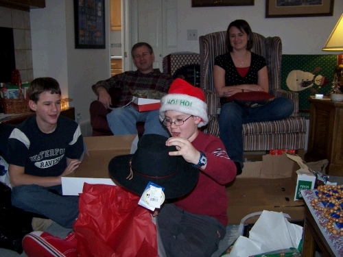 Clark's excitement as he sees his new cowboy hat...