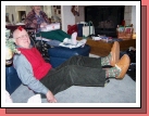 Grandpa displaying possible replacements to his 45-year-old favorite slippers.  