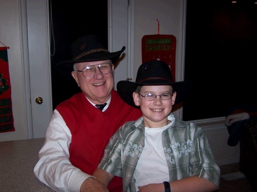 Grandpa and Clark -- proud owners of the matching cowboy hats.