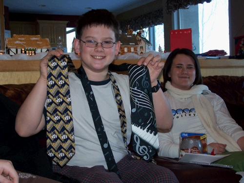 Clark loves that he is tall enough for "grown up" ties now.