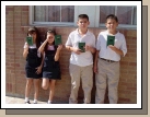 Castillo kids with their new hymn books and CTR rings.