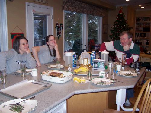 The girls making fun of their dad's pose -- he is pretty good natured about all the teasing that comes his way.