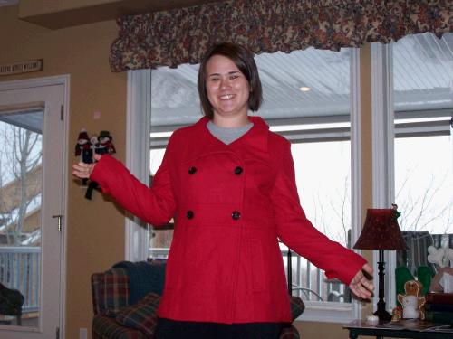 Tess thrilled with her new red pea coat.  