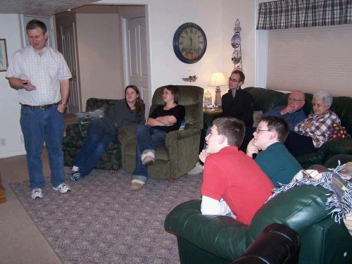 Gathering downstairs to watch the "Gift From the Heart" on our new TV.  Alan and I had filled a DVD with Christmas videos from the past.  It was really fun to see the kids and scary to see ourselves in the past!