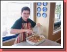 Clark prepared the traditional breakfast casserole for Christmas morning. Of course he wore his new apron from Grandma Pat!