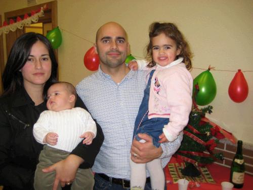 Kike (short for Enrique), his wife Ana, and their kids (Minerva and ?). Kike speaks only in English to his daughter and she's nearly bilingual.