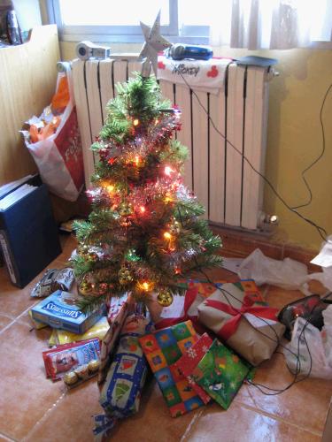 Christmas morning, opening presents. 