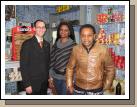 Betty and Innocent, our investigator, at Betty's brother's shop where she worked and where we taught her, and sometimes Innocent, too. The shop sells African food and beauty products (note the hair extensions in the top left corner).