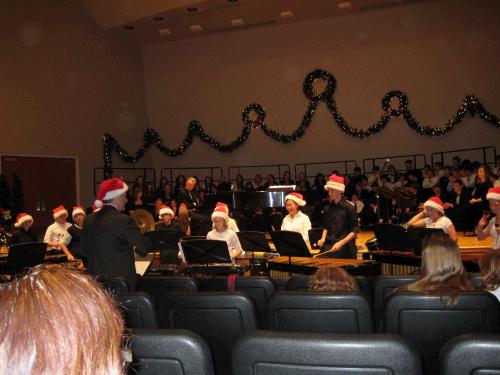 The percussion ensemble performing "I Saw Three Ships."  They did a great job and had a lot of fun performing together.  Elliot is in the black shirt in the front on the right and Clark is in the white shirt second to the left of the conductor.