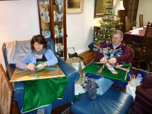 Diane and Alan opening a "Family History" gift...