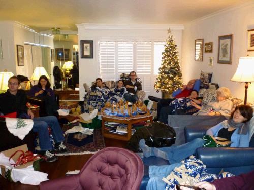 The whole family sitting around watching Great Grandma Thirza's home movies on the big screen.